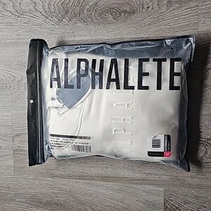 New in package. Alphalete hoodie. Cream. Womens xs.